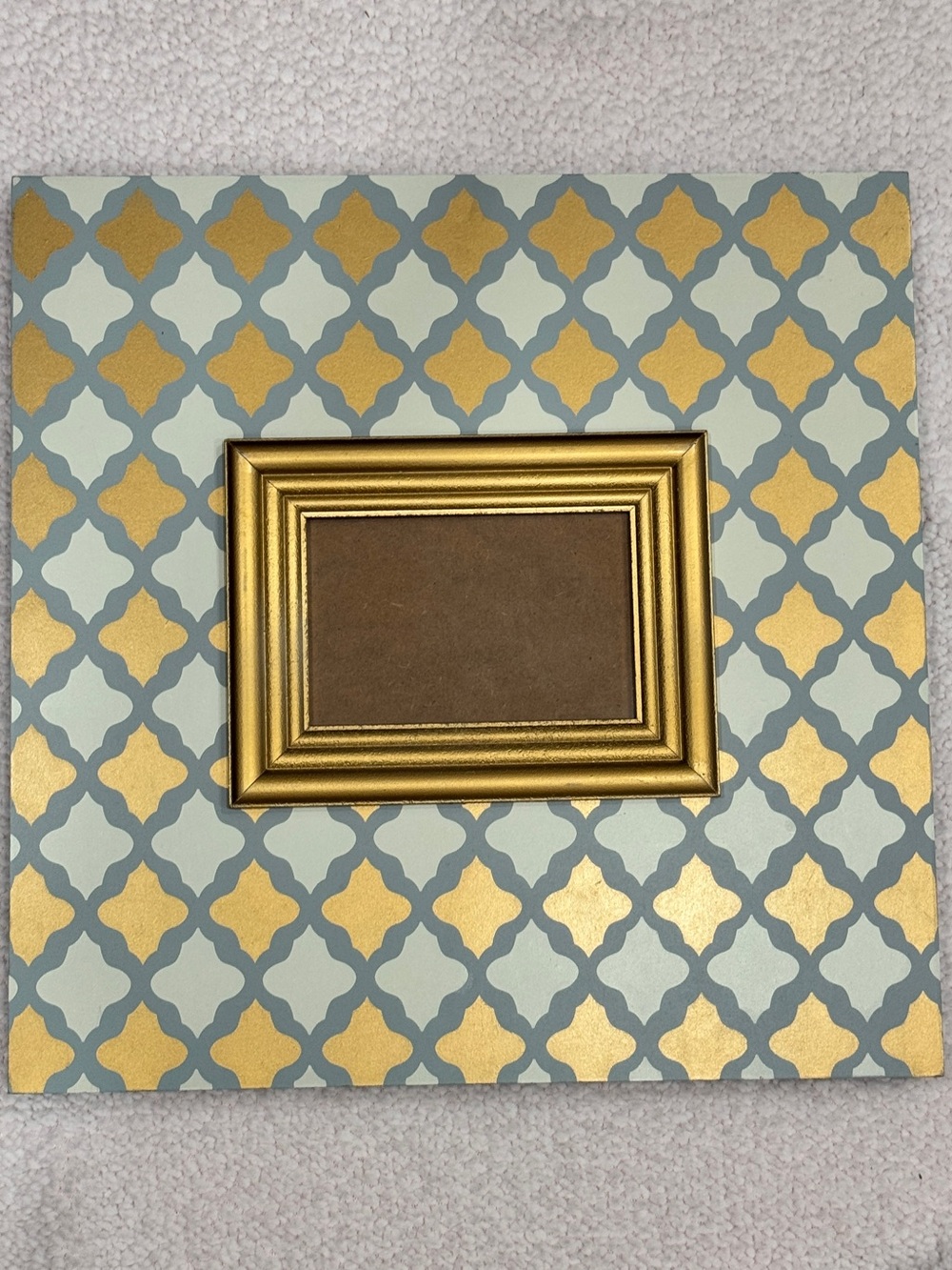 Hobby Lobby Gold Frame on Blue and Gold Patterned Canvas